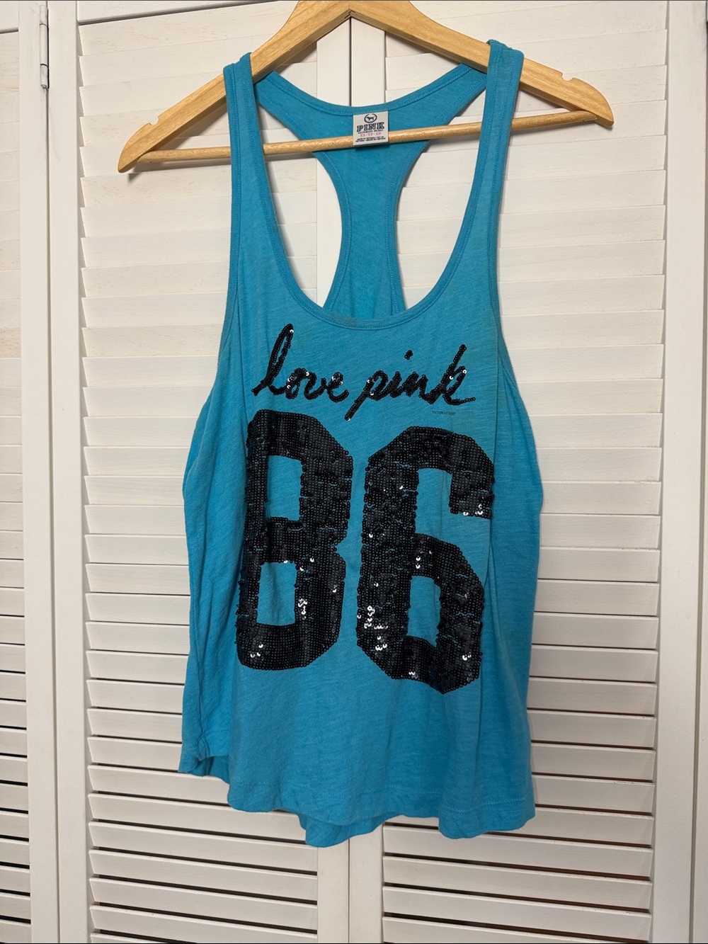 PINK Victoria's Secret Teal Racerback Tank with Black Sequin '86' Graphic